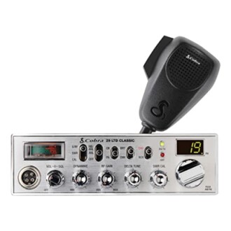 Cobra 29 LTD Classic CB radio with microphone and control knobs.