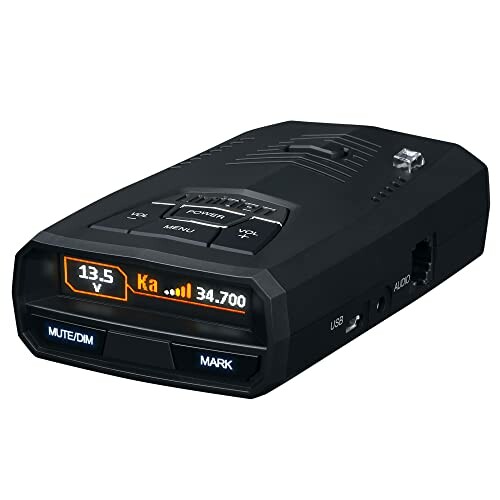Black radar detector with display showing numbers and buttons.